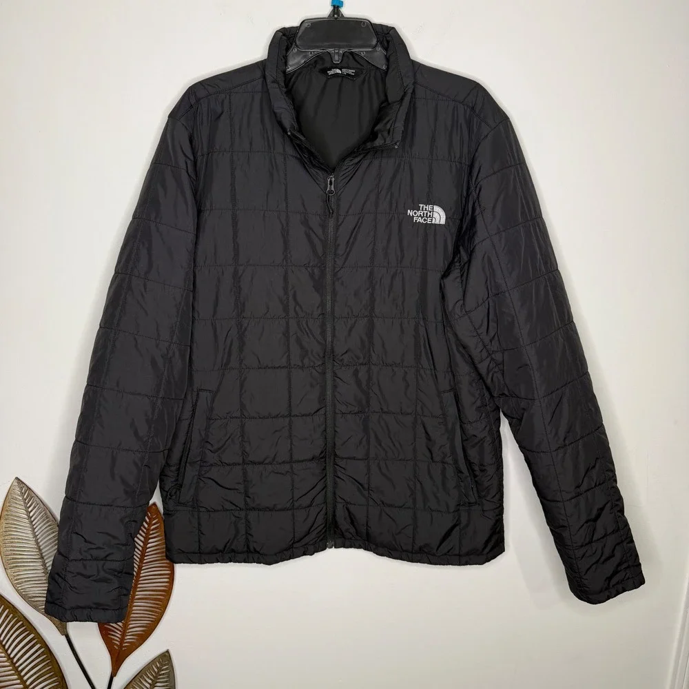 The North Face size pit